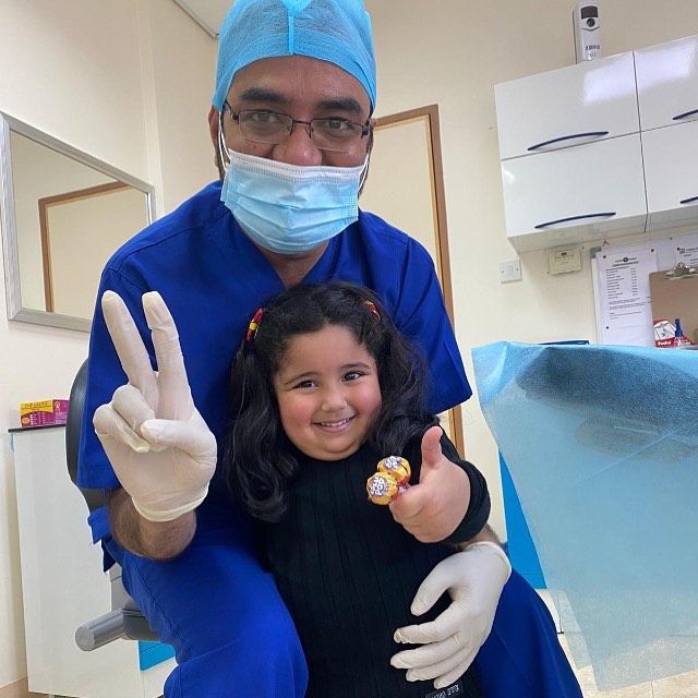 Happy young patient at Saeed Dental
